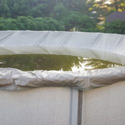 remove water from a swimming pool cover